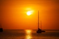 Silhouette Yacht boat sailing boats or Travel boats in Beautiful phuket sea at sunset golden sky Amazing for summer holiday