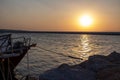 Silhouette of yachts at sunset in the harbor. Sunset over the sea. Fishing boats in the port. Boats in the bay at sunset Royalty Free Stock Photo