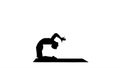 Silhouette Yogi doing camel yoga pose.