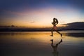 Silhouette of young Asian sport runner woman in running workout Royalty Free Stock Photo
