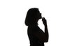 Silhouette of young black woman thinking something Royalty Free Stock Photo