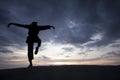 Silhouette of young boy performing a pencak silat Royalty Free Stock Photo