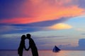 Silhouette of a young bride and groom in beach Royalty Free Stock Photo
