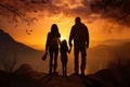 Silhouette young couple hiker standing on a mountain