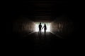 Silhouette of young couple holding hands Royalty Free Stock Photo