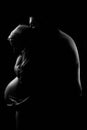 Silhouette of young couple in pregnancy
