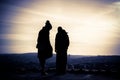 Silhouette of young couple at sunset Royalty Free Stock Photo