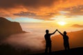 Silhouette of Young family happy look sunrise Royalty Free Stock Photo