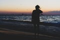 Silhouette of a girl waiting for sunrise at Black Sea