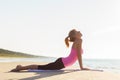 Silhouette of young healthy and fit woman practicing yoga Royalty Free Stock Photo