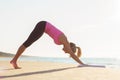 Silhouette of young healthy and fit woman practicing yoga Royalty Free Stock Photo