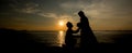 A silhouette of a young man, down on one knee and holding a bouquet, proposing to his girlfriend. will you marry me images. Royalty Free Stock Photo