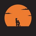Silhouette young man kissing his pregnant wife`s belly on sunset background