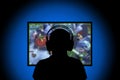 Silhouette,Young man playing video games on pc at home Royalty Free Stock Photo