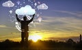 Silhouette young man standing with ccloud uploading data on the Internet online.network,