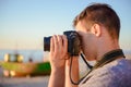 Silhouette of young photographer on the beach Royalty Free Stock Photo