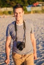 Silhouette of young photographer on the beach Royalty Free Stock Photo