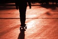 Silhouette of a young skateboarder