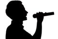 Silhouette of a young talented man singing into a microphon