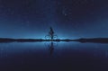 Silhouette of young woman cyclist at night sky