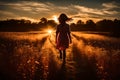 Silhouetted Young Woman Walks Into Beautiful Sunset Royalty Free Stock Photo