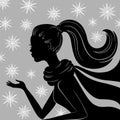 Silhouette of young woman with flying snowflakes Royalty Free Stock Photo