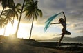 Silhouette of young woman jumping at Las Galeras beach Royalty Free Stock Photo