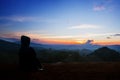 Silhouette young woman watching sunset Royalty Free Stock Photo