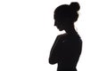 Silhouette of a young woman on a white isolated background, face profile of a beautiful girl