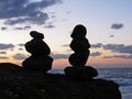Silhouette of Zen Stones Pyramid at Ocean Shore Seaside During Beautiful Sunset