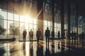 silhouetted business people in the office building Royalty Free Stock Photo