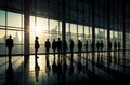 silhouetted business people in the office building Royalty Free Stock Photo