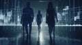 Silhouetted business professionals walk through digital data environment Royalty Free Stock Photo