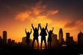 Silhouetted business team celebrates collaboration with joyful, triumphant happiness