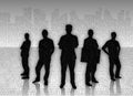 Silhouetted businessmen