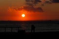 Silhouetted Couple at Sunset