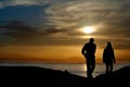 Silhouetted couple at sunset