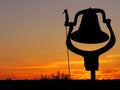 Silhouetted Dinner Bell Royalty Free Stock Photo