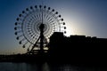 Silhouetted ferry wheel