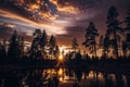 Silhouetted forest sunset reflection on pond Royalty Free Stock Photo