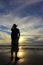 Silhouetted man on beach Royalty Free Stock Photo