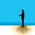 Silhouetted man with roots Royalty Free Stock Photo