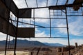 Silhouetted metal scaffolding at an abandoned lead mine near Bonnie Claire, Nevada, USA