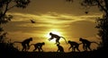 Silhouetted Monkeys Playing at Sunset: A Captivating Wildlife Scene Royalty Free Stock Photo