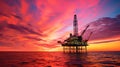 silhouetted oil rig gulf of mexico A dramatic sunset serves as