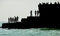 Silhouetted People On Brighton Coast