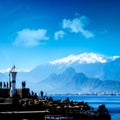 Silhouetted people walking in Antalya harbor Royalty Free Stock Photo