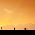 Silhouetted people walking in Antalya harbor Royalty Free Stock Photo