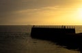 Silhouetted Pier at Sunset Royalty Free Stock Photo