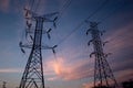 Silhouetted power lines at dusk